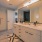 a bathroom with a large mirror