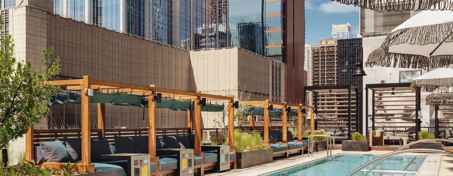 pool and reflections with reclining seats and modern stonework