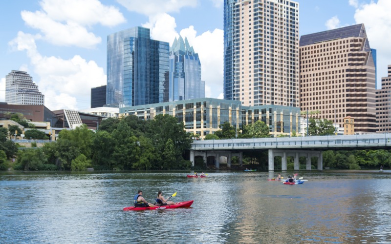 people kayaking on the river 