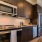 a kitchen with wooden cabinets