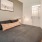 a bedroom with a bed and a door