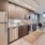 a kitchen with wooden cabinets