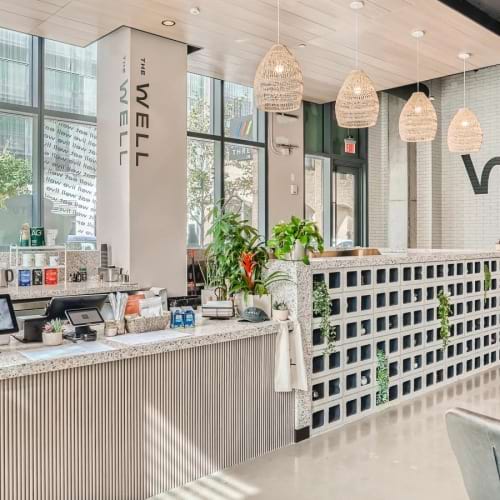 Settle into comfort at Sienna at the Thompson a room with a table and chairs